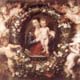 The Virgin and Child in a Garland of Flower